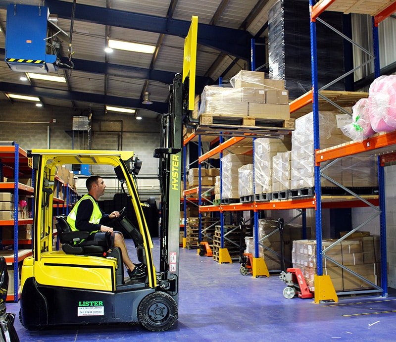 Simon on forklift | Bondline Electronics Ltd