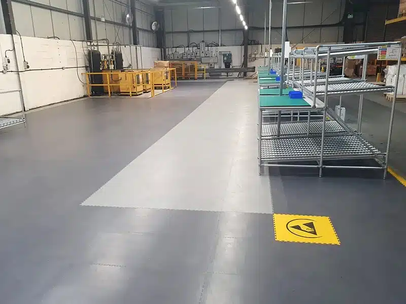 Installation of Interlocking ESD Floor Tiles at customer's site, completed by Bondline