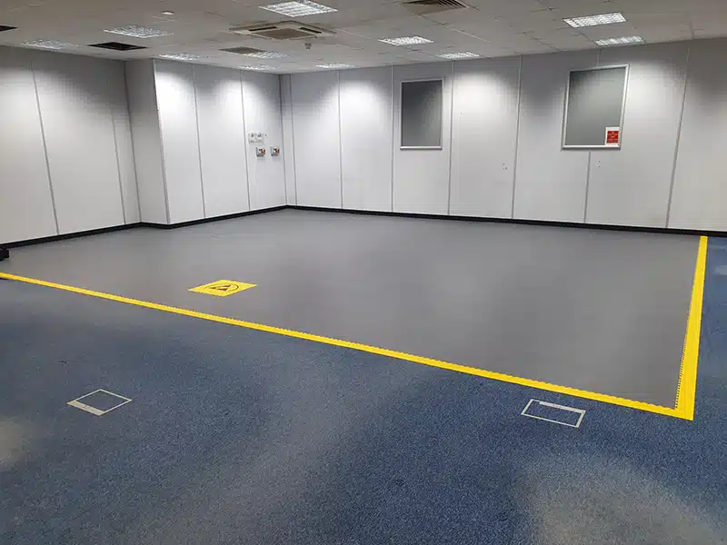 An installation of interlocking ESD floor tiles in an Electrostatic Protected Area completed by Bondline