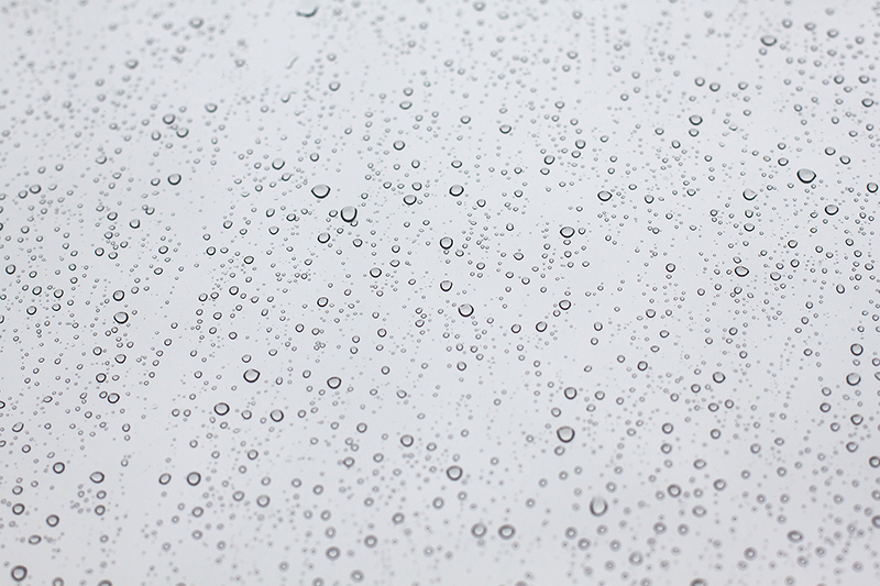 Raindrops on window showing an example of moisture - Bondline