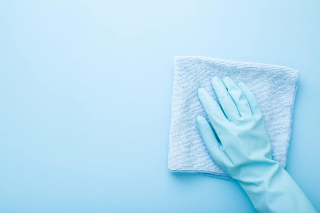 Hand,In,Rubber,Protective,Glove,Wiping,Table,,Wall,Or,Floor
