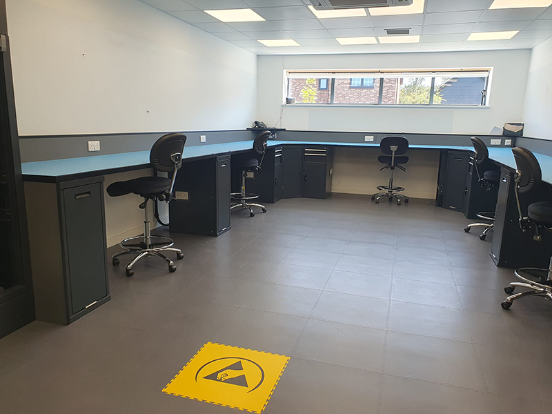 A new ESD safe room established by Bondline Electronics Ltd for Renvale Ltd. Installation of ESD interlocking floor tiles, ESD Chairs, ESD bench matting and ESD test meters.